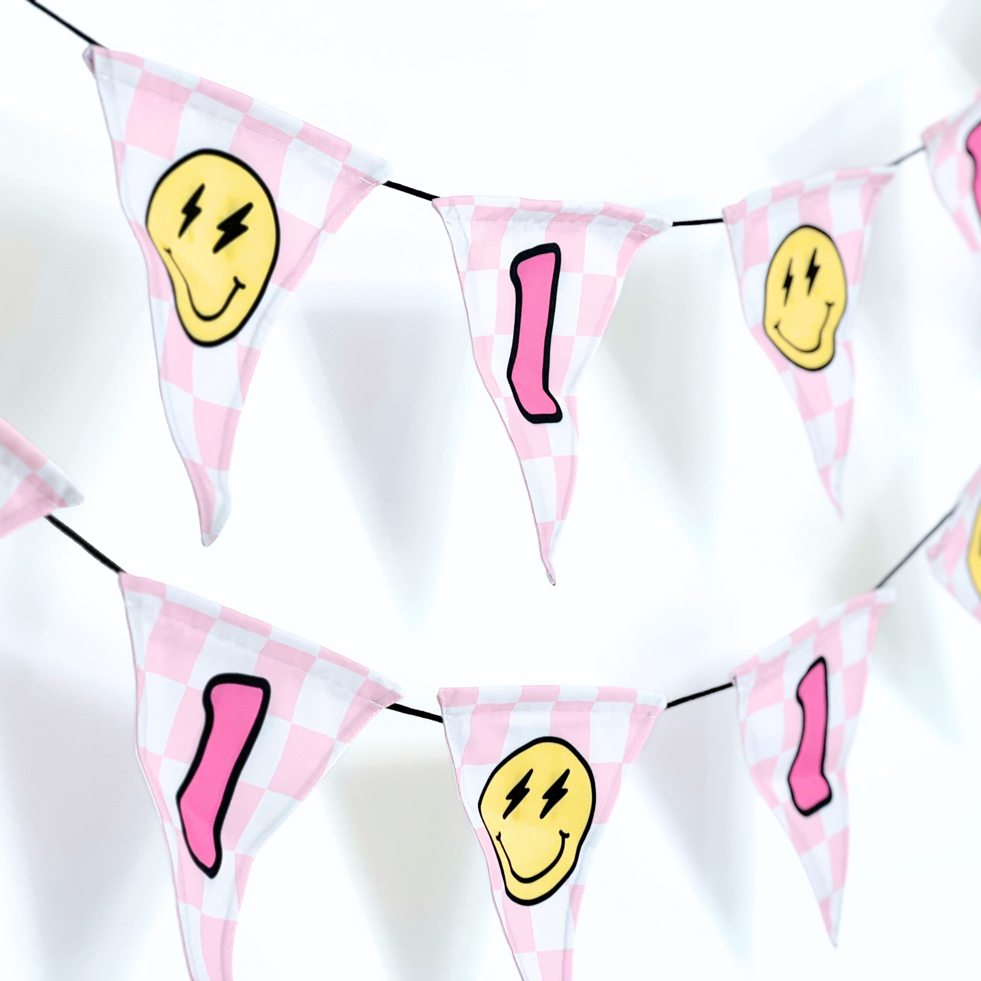 Bunting flags with smiley face and number design on a white background