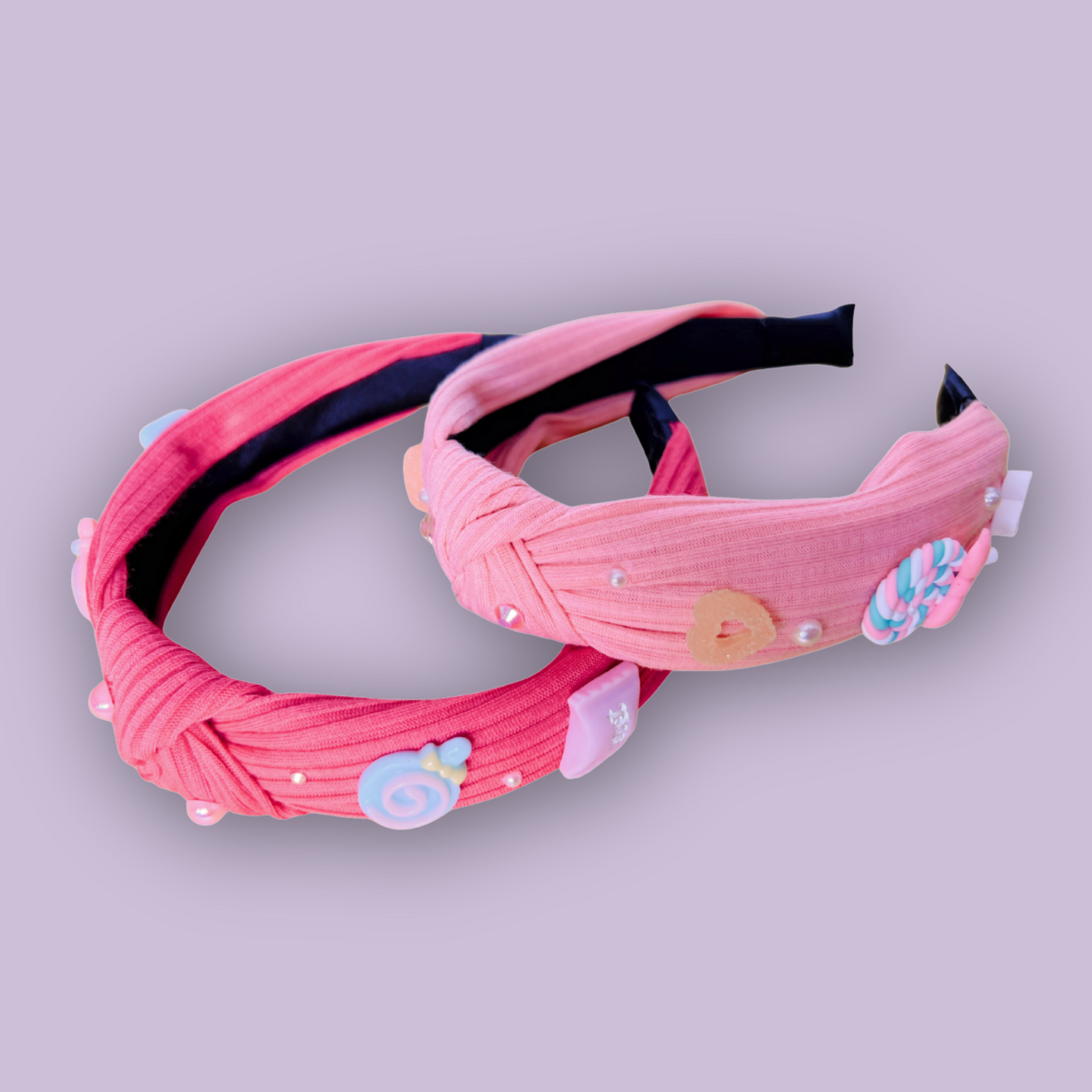 two pink headbands with cute candy charms and pearl rhinestones