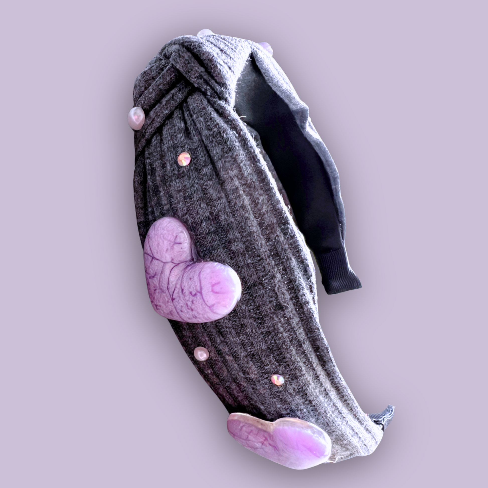 a gray charm headbands showing front and side detail of Purple Heart charms on lavendar background