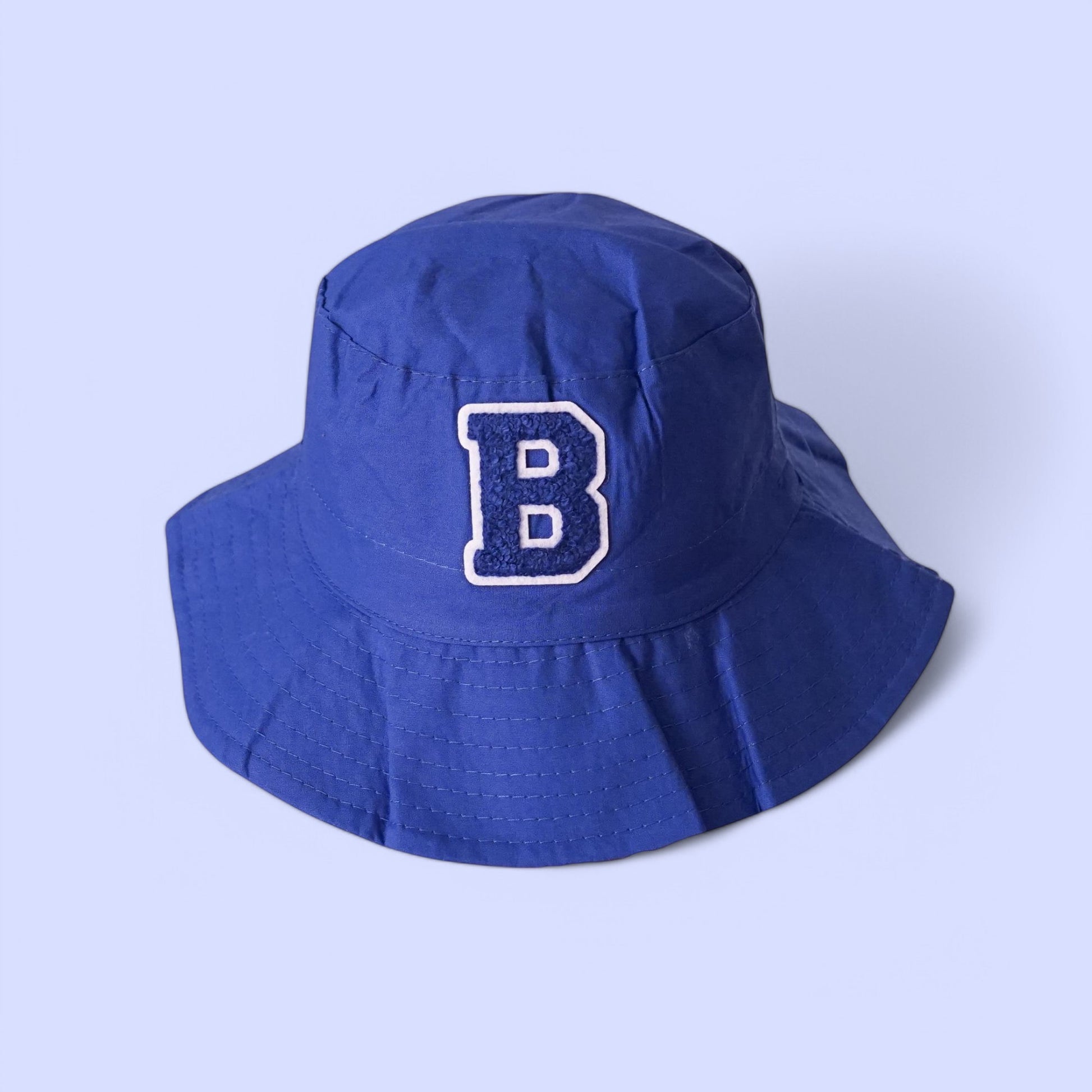Top view of personalized toddler hat showing fabric and patch detail