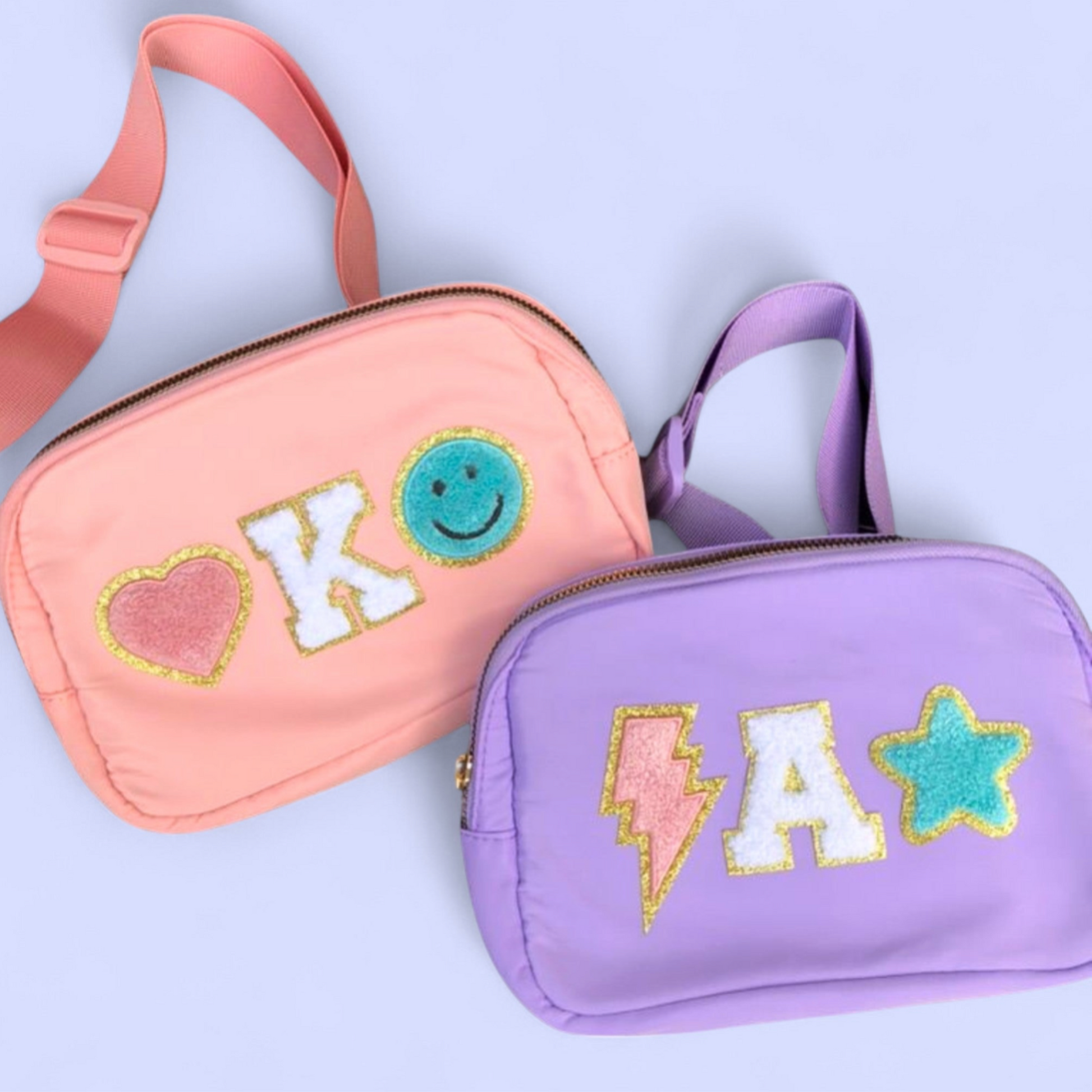 Two colorful fanny packs with chenille letter patches K and A on soft backgrounds