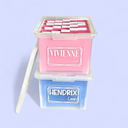 Organized memory box filled with school papers and artwork